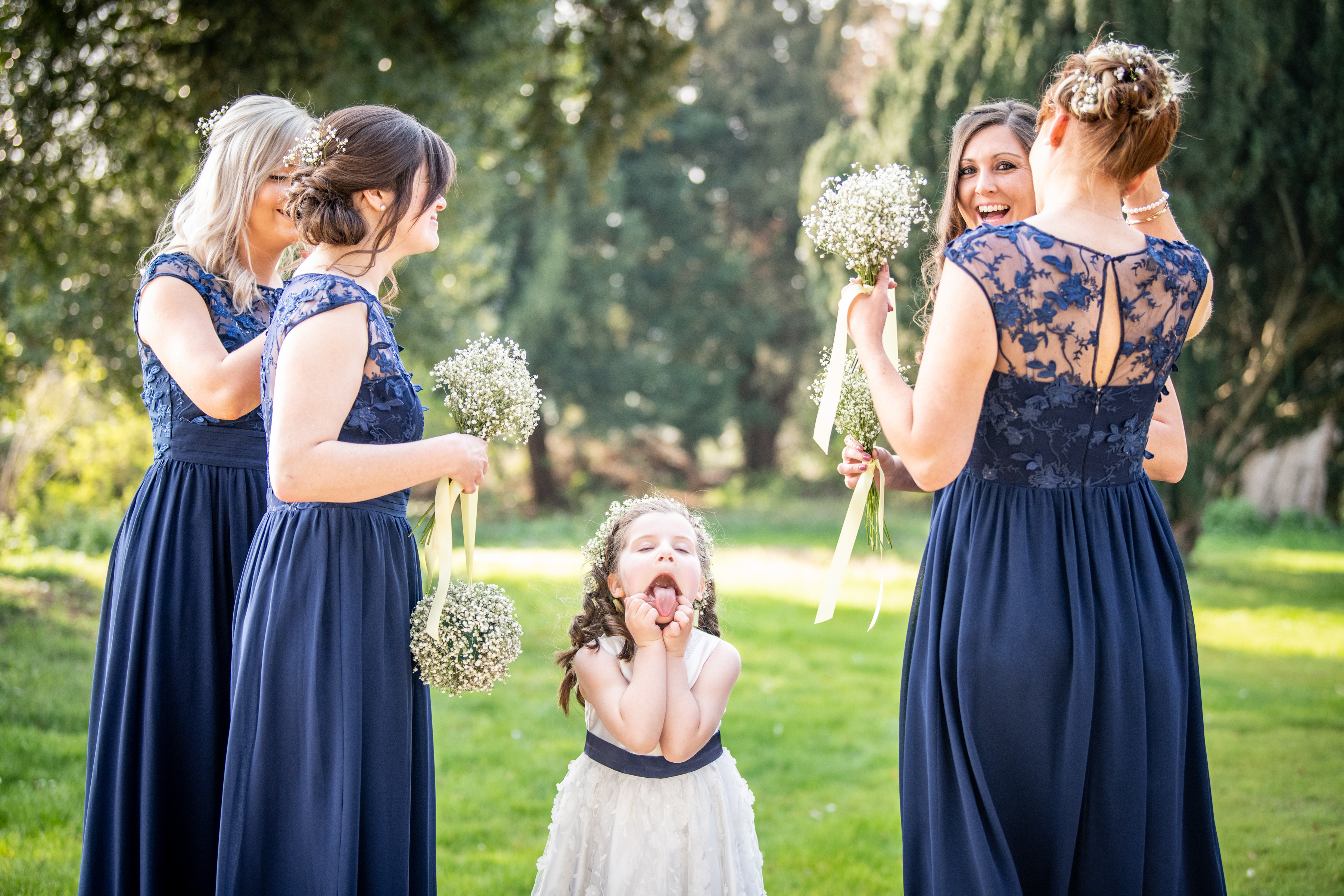 flowergirl pulls face